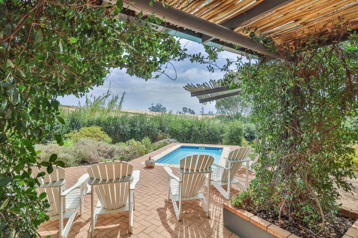 Riebeek Vista swimming pool and shaded garden patio